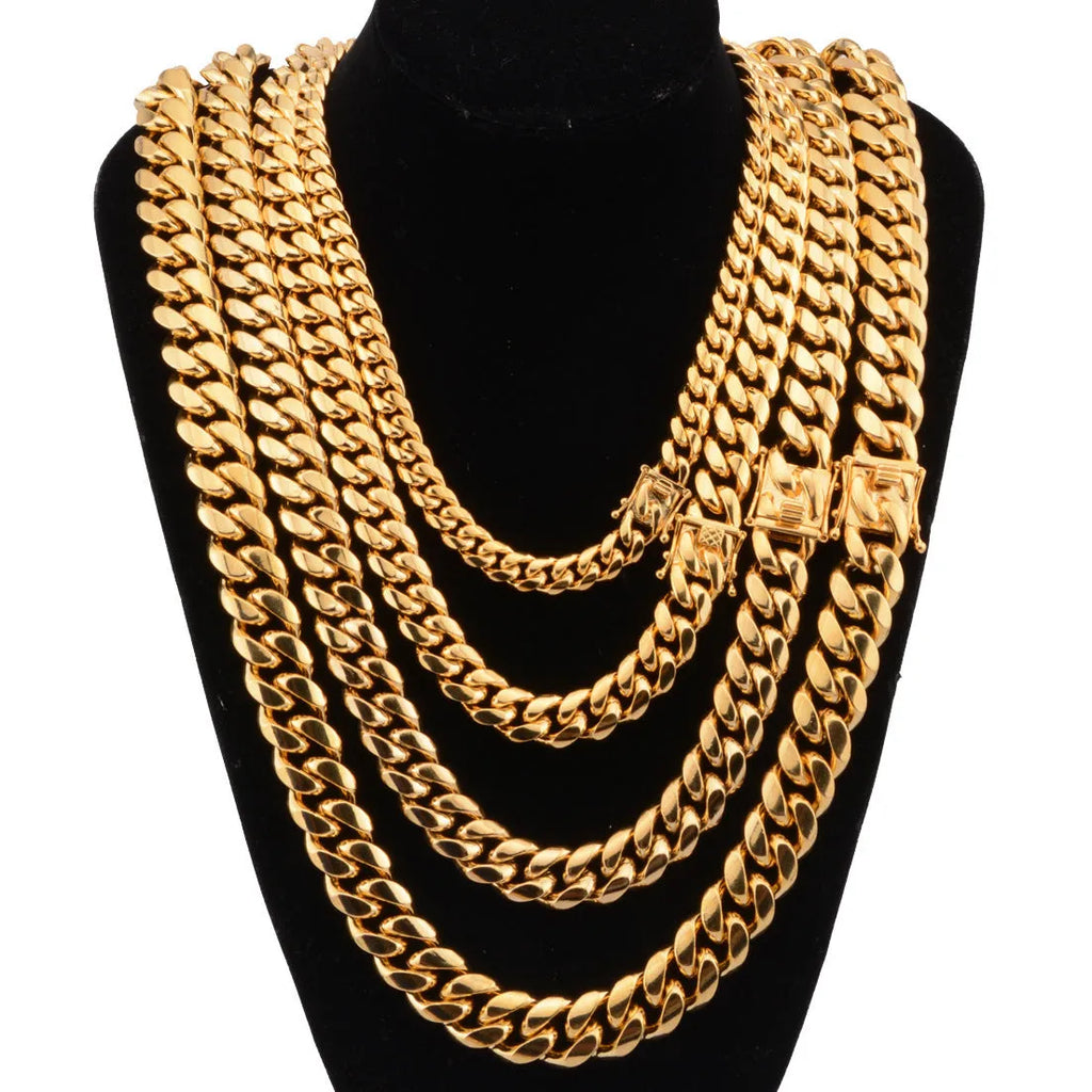 Gold Miami Cuban link stainless steel chain necklace on white background
