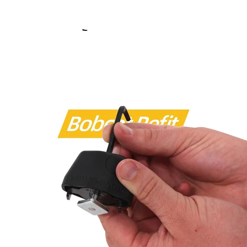 Steel cable fixed lock with plastic-sheathed cables for securing equipment on a vehicle roof platform.