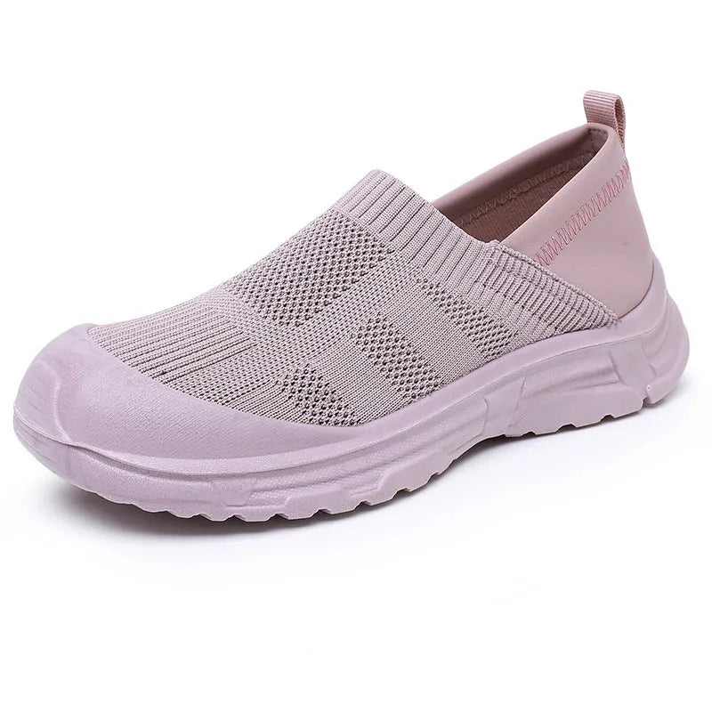 Women's slip-on casual shoes with cloth uppers and soft PVC soles in round toe design