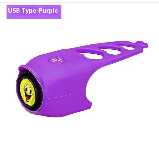 Plastic electronic bicycle horn in six colour choices showing compact size for handlebar mounting.
