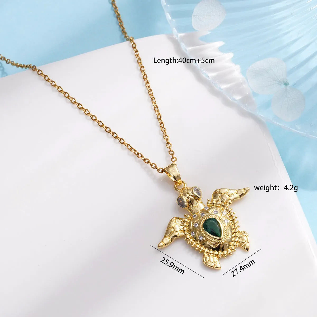 Gold-plated copper sea turtle necklace with zirconium accents and mixed gemstone inlay, O-link chain, light luxury style for women