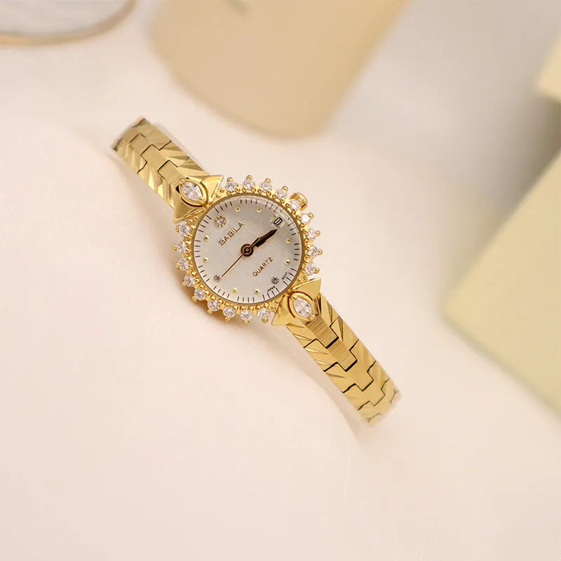 Women's quartz watch with diamond-textured metal bracelet and slim 6mm gold-tone case