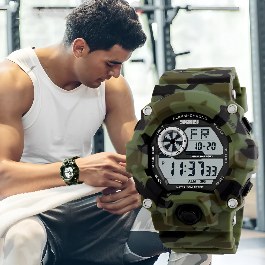 Waterproof electronic sports watch with round dial and plastic strap in army green colour.