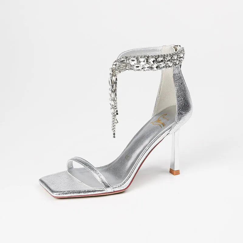 Women's silver ankle-strap sandals with 8cm high heels and square open toe design