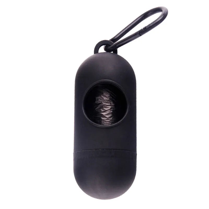 Black dog poop bag holder with side hook and Velcro closure, showing compact size.
