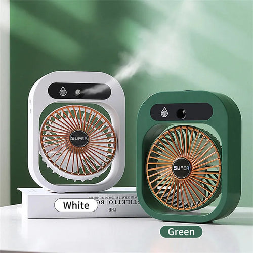 Green and white USB portable misting fan air cooler humidifier on a desk