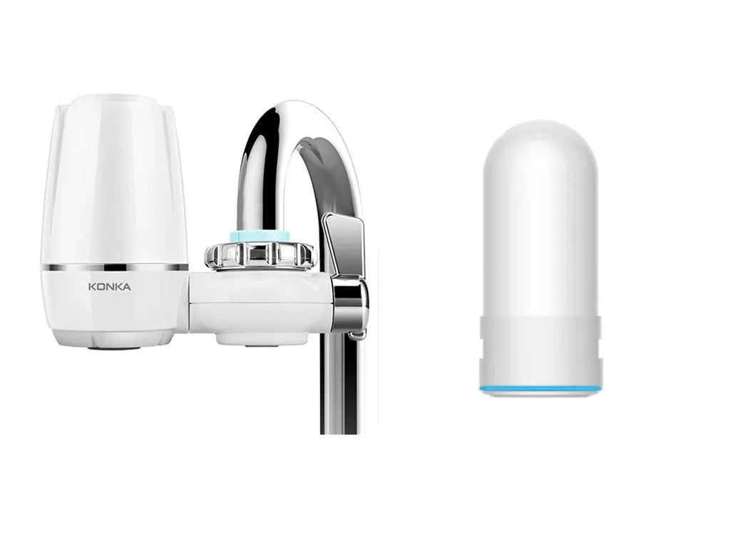 White plastic faucet water filter unit with adapters and ceramic cartridge for kitchen tap installation.