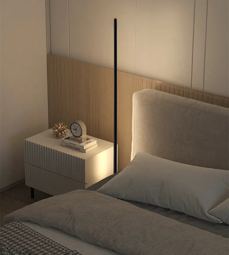 Modern simple vertical aluminium alloy floor lamp in three height sizes on a plain background.