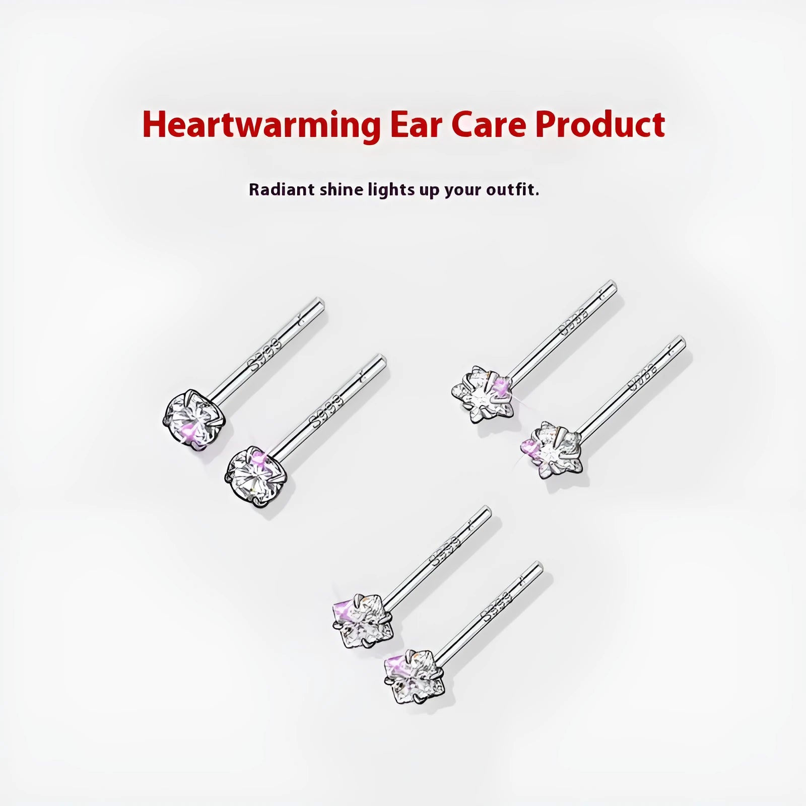 999 pure silver anti-blocking ear studs in butterfly shape on white background