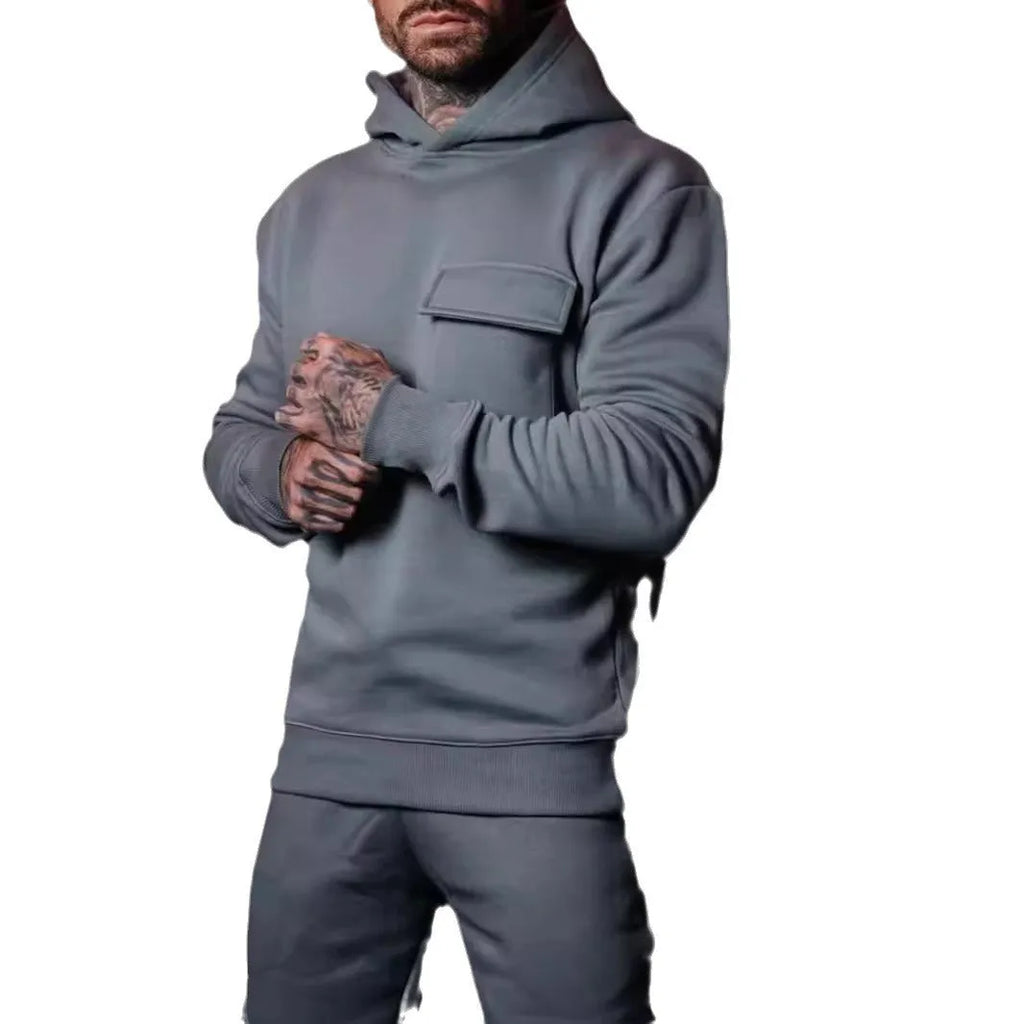Plus size hooded pullover with dimensional patch pocket in solid colour, slim fit polyester casual top