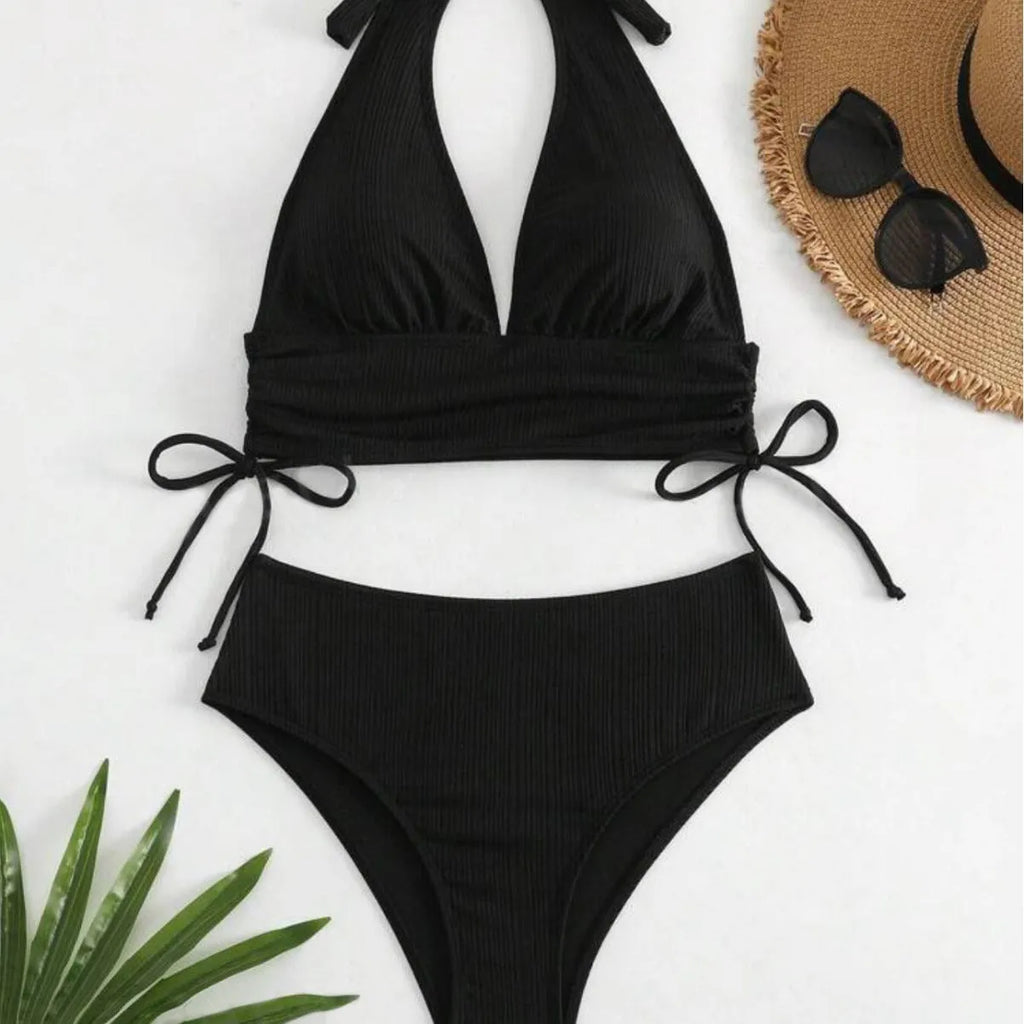 Women's black halter bikini with lace-up front detail and briefs bottoms