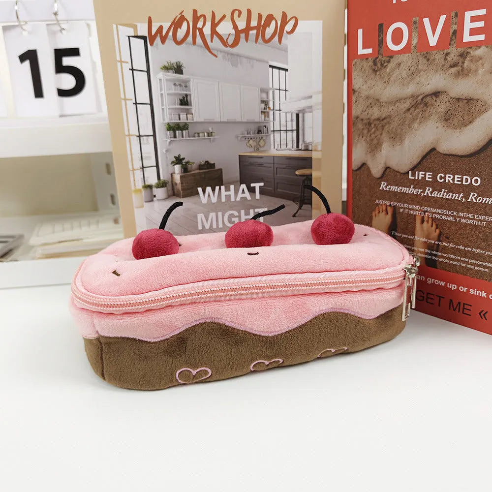 Cherry Cake coloured plush velvet pencil bag with a zip closure.
