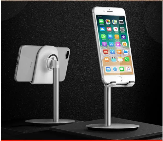 Silver metal S1 computer phone holder supporting tablet on desktop