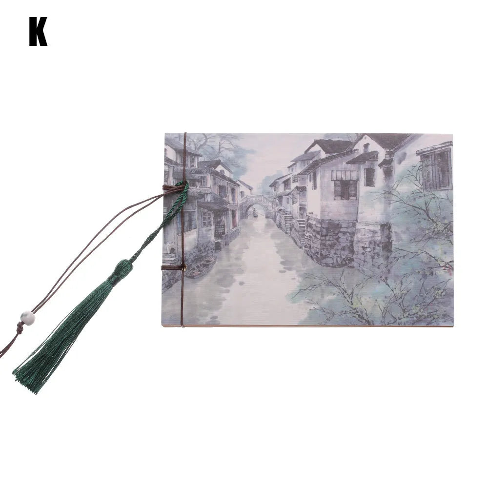 Hand-stitched kraft paper notebook with a tassel bookmark, shown in a natural colour.