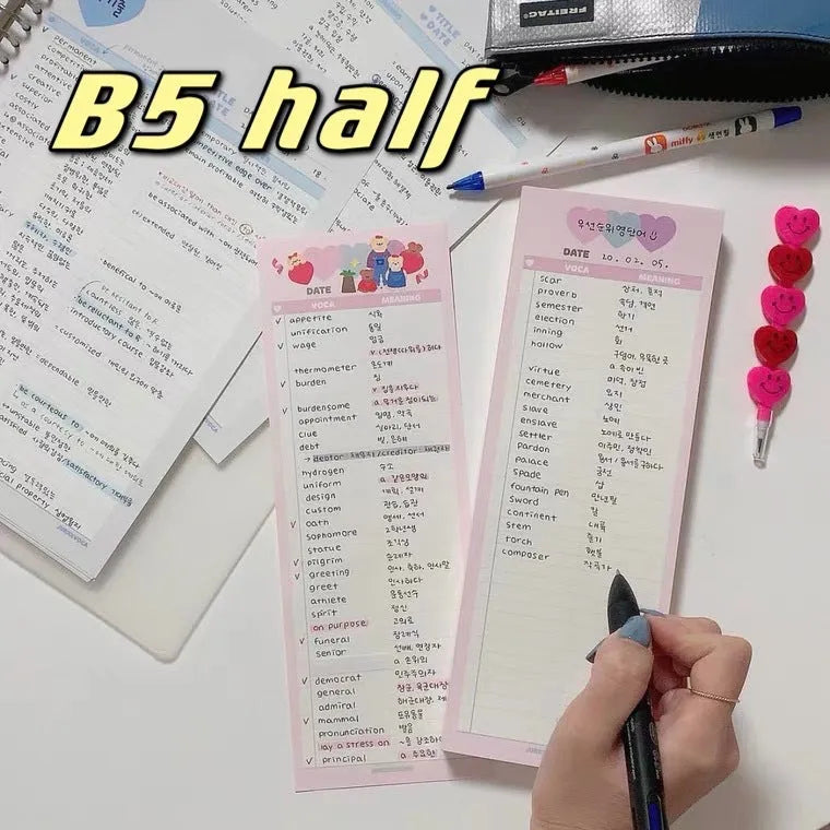 Vertical B5 half-size notepad in blue, pink, or purple cover, showing double-sided pages.