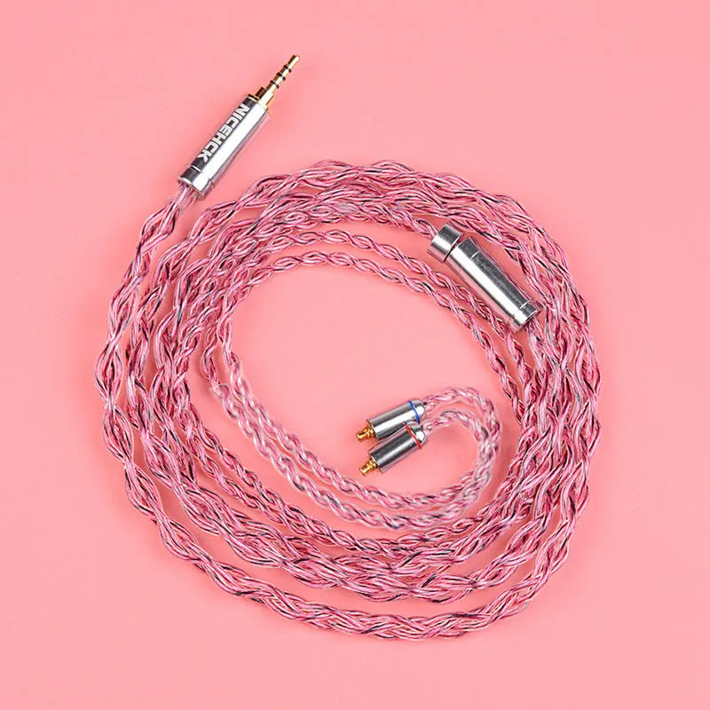 Black German pure copper headphone cable with 3.5mm angled plug and MMCX connectors on a light background