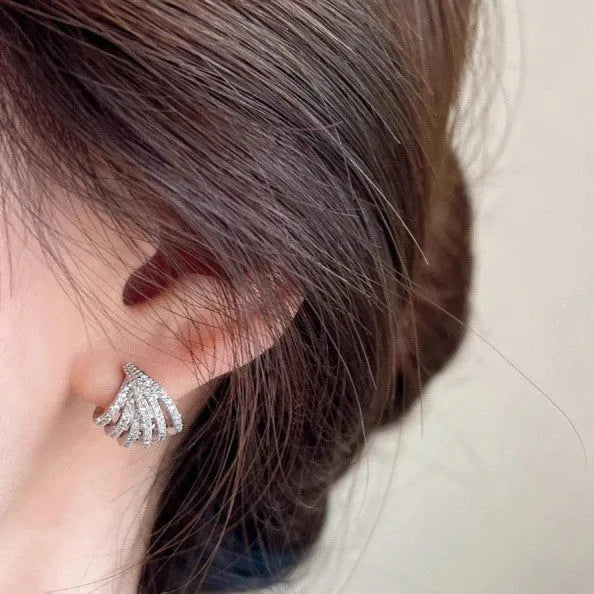 A pair of women's geometric drop earrings in a platinum colour, made from zircon with an electroplated finish.