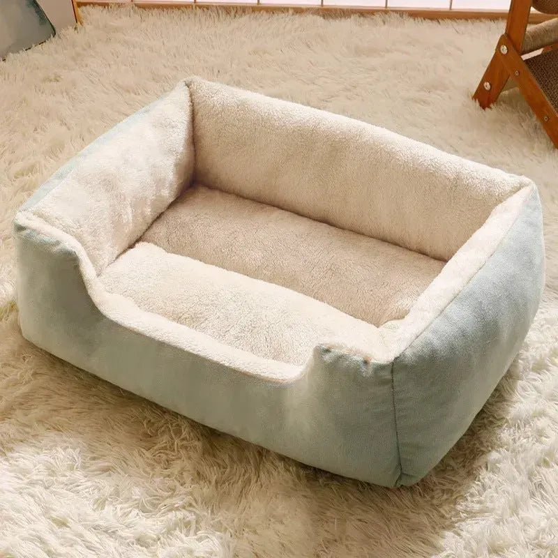 Short plush rectangular pet bed for cats and dogs with a removable cover in grey, shown in a large size.