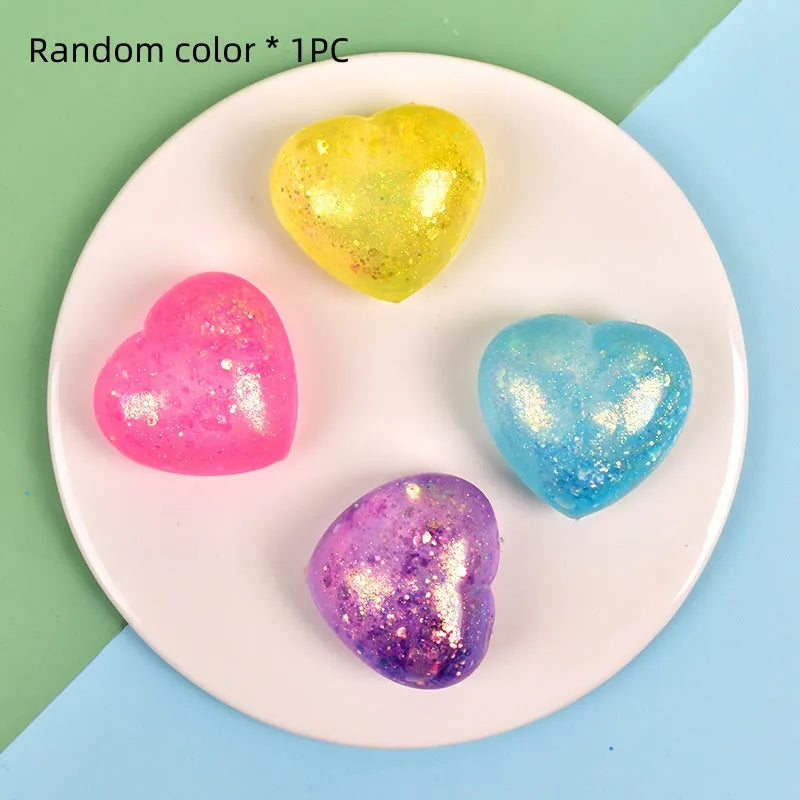 Malt sugar love squeezing toy vent ball in TPR, heart shape, 6 cm by 5.5 cm, random colour, for teens aged 7-14