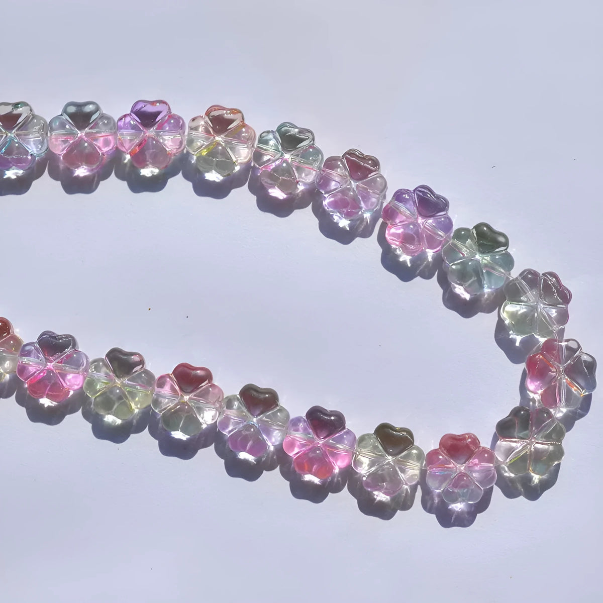 10mm gradient colour crystal glass beads in four-leaf clover shape with transparent iridescent electroplated finish