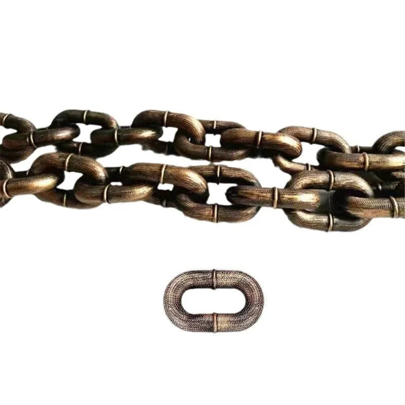 Large bronze coloured plastic dog leash prop on a white background.