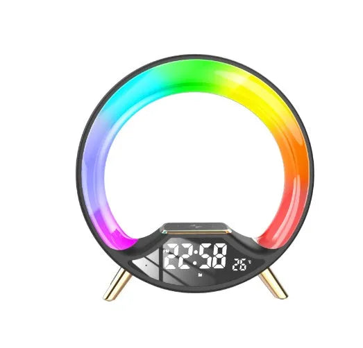 LED Colourful Music Atmosphere Clock in black, a wireless charging night light with Bluetooth speaker and digital display.