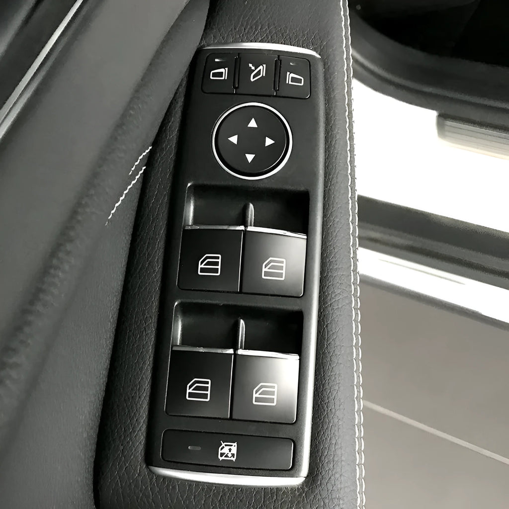 Black ABS plastic decorative sticker for car window lift button on door panel.