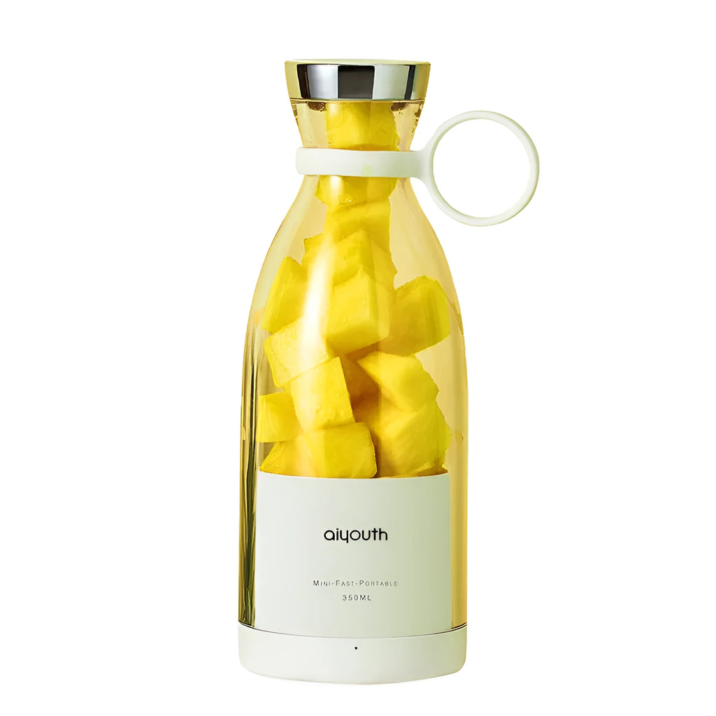 Handheld portable USB mini juicer in pink with four cutter head system for fresh juice extraction