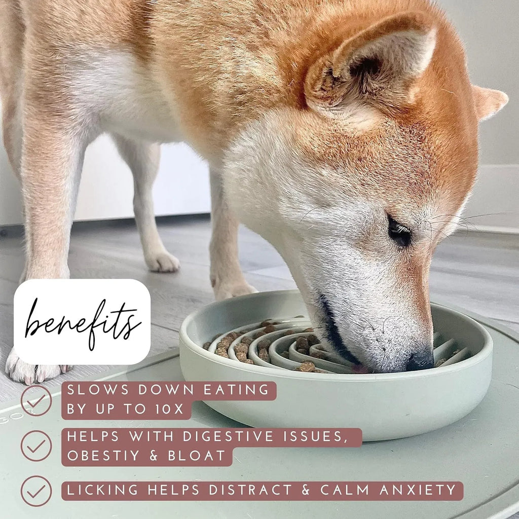 Silicone slow feeder dog bowl with textured ridges, shown in beige colour on a wooden surface.