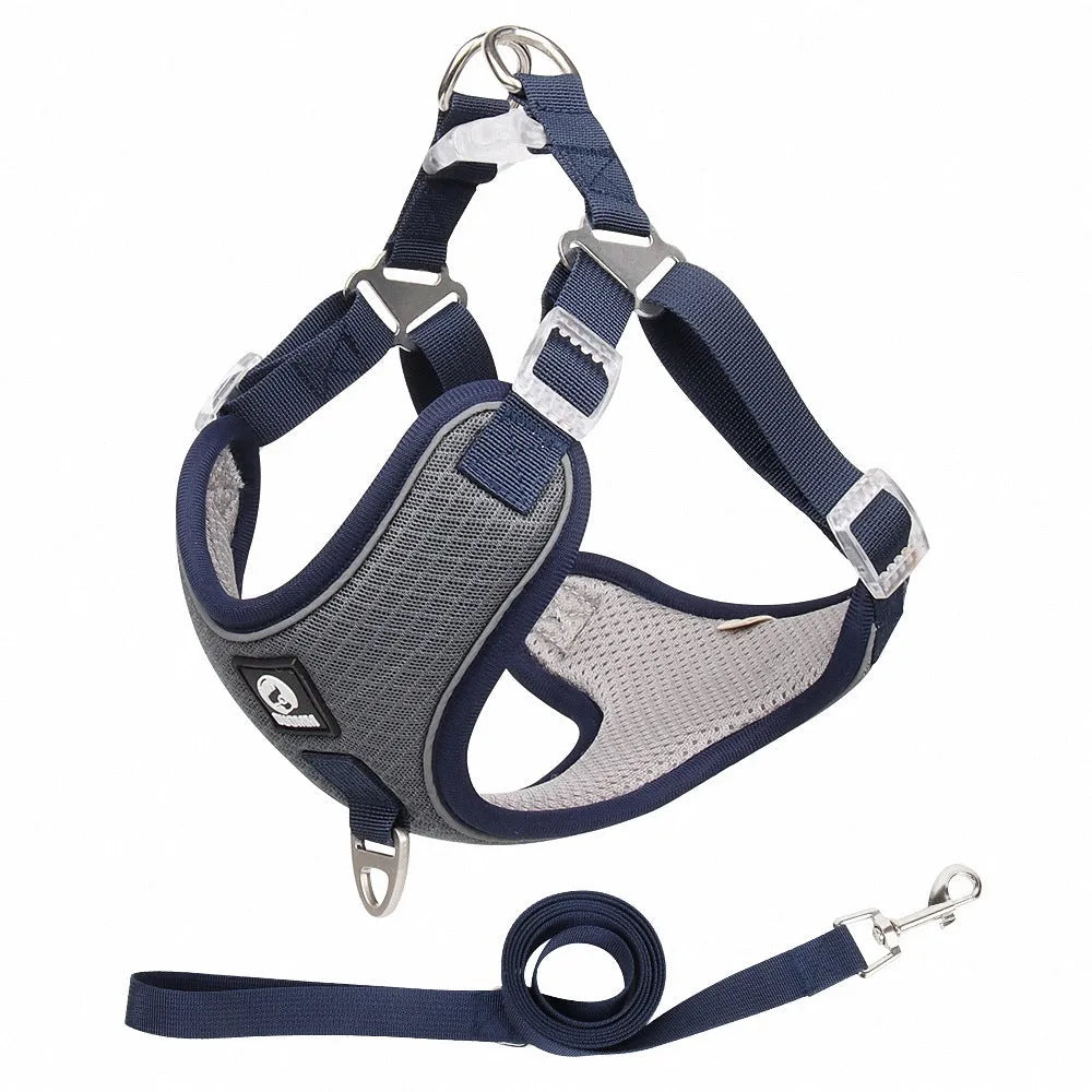 Adjustable mesh dog harness with reflective piping in light purple colour on a small dog