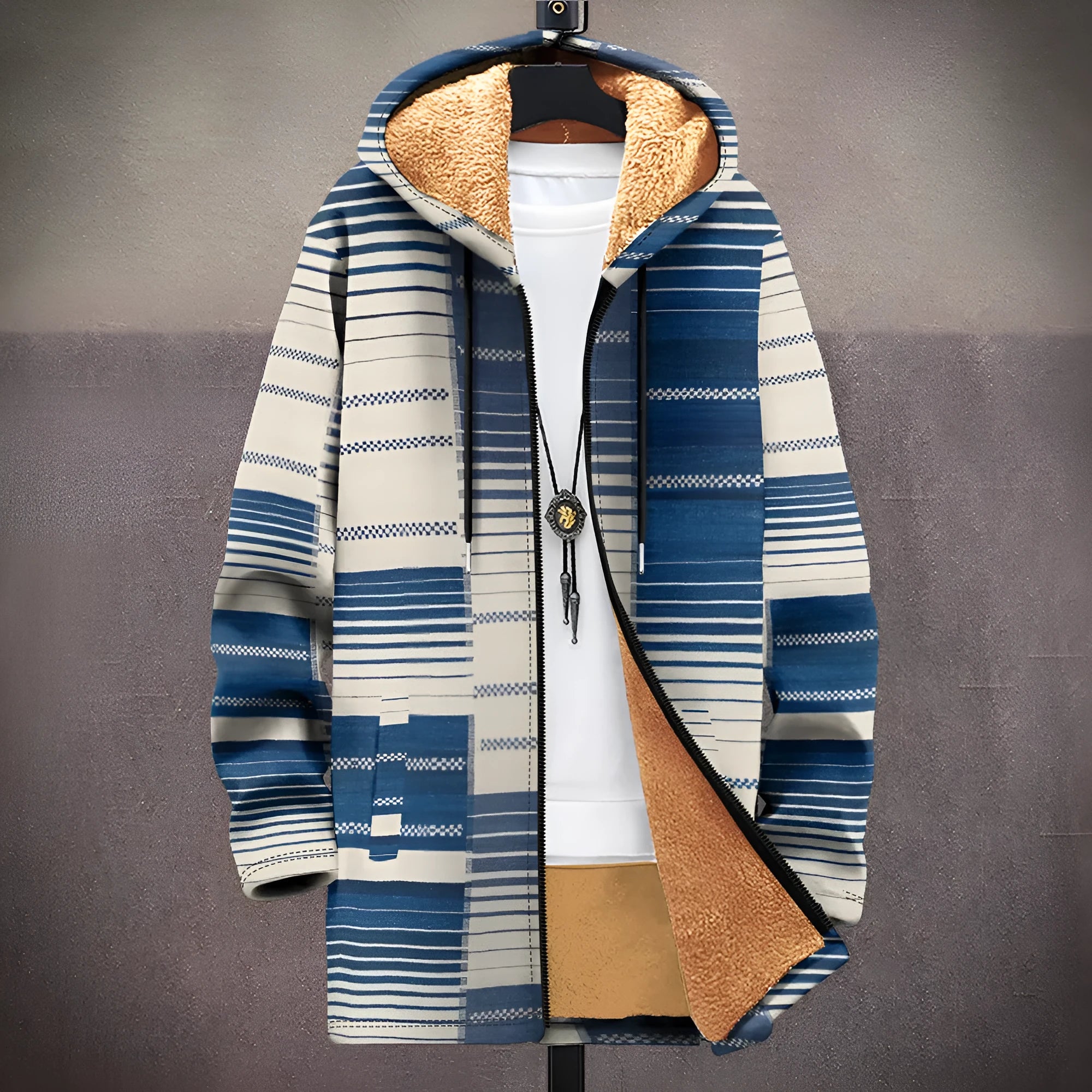 Man wearing a loose-fit, zip-up hooded cardigan with a multicolour digital print pattern.