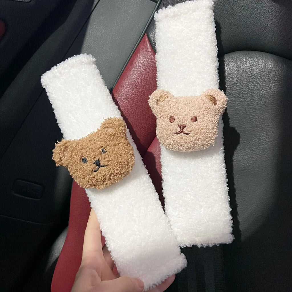 Cartoon bear plush seat belt cover for baby car seats showing khaki and coffee colour options