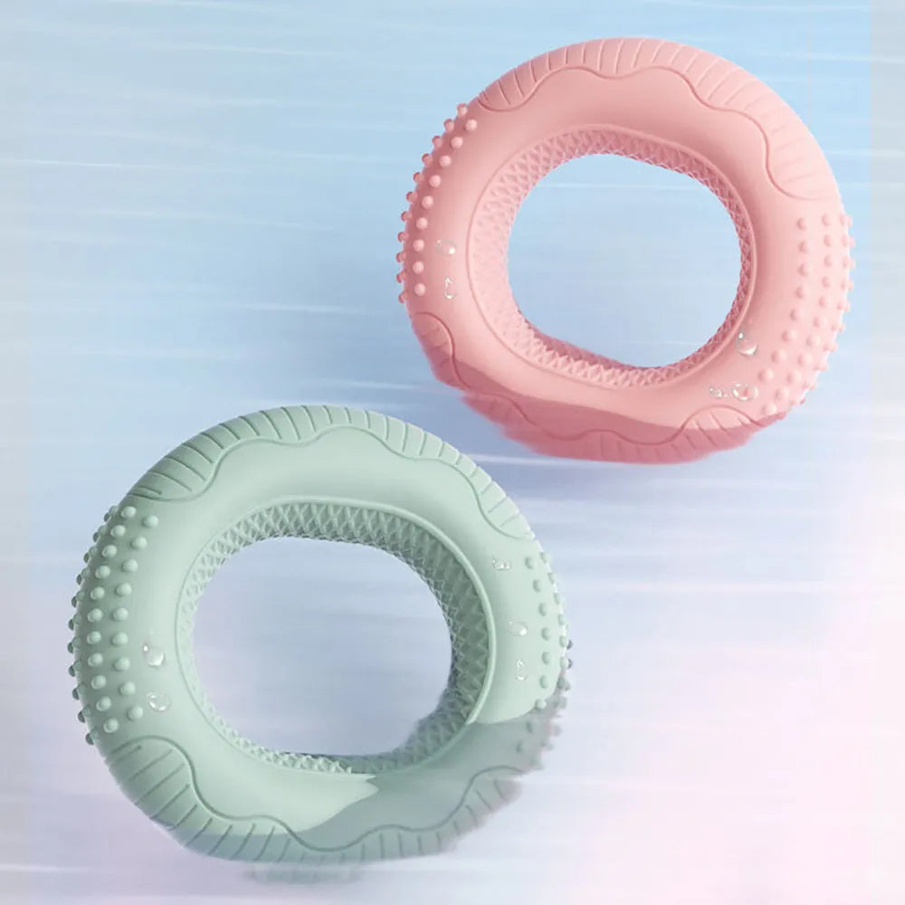 Silicone hand grip ring in five colours showing textured surface and compact 7.4cm size for finger and forearm strength training