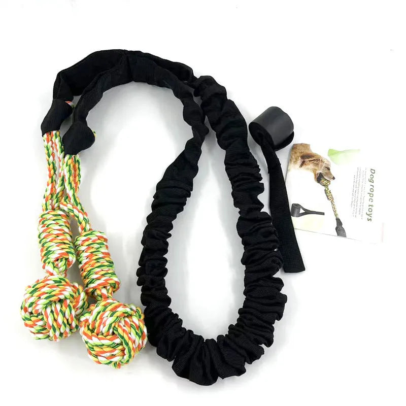 A long, woven cotton rope dog tug toy shown in a choice of black, grey, or red.