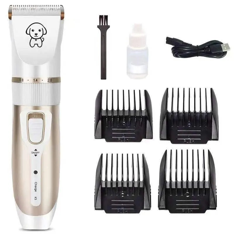 White handled dog grooming clipper kit with ceramic blades, four combs, oil, brush and USB cable on table.