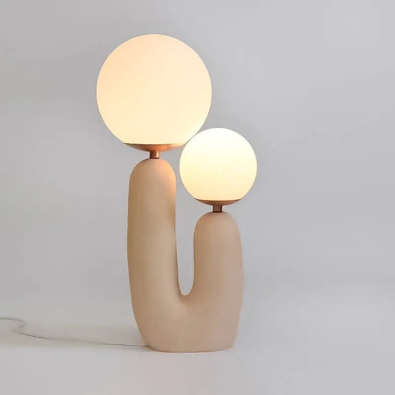 Double-head resin table lamp with pink baking paint finish, glass shade, 49cm height, on bedside table