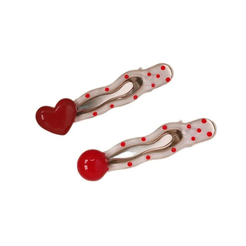 Red love heart shaped willow leaf hair clip with dots, a French retro Korean-style barrette.