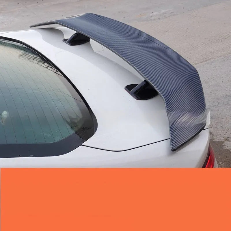 Universal punch-free fixed-air car spoiler tail wing made from black ABS plastic.