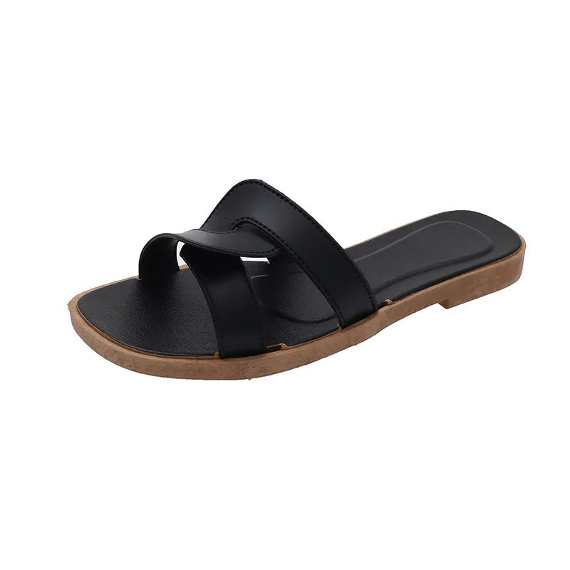 Women's PVC cross-strap sandals with toe ring and non-slip sole in light blue colour.