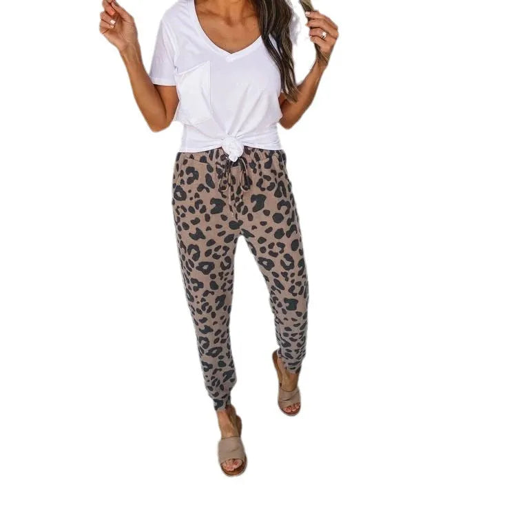 Women's polyester pencil leggings with leopard print irregular colour-block pattern, mid-rise elastic waist