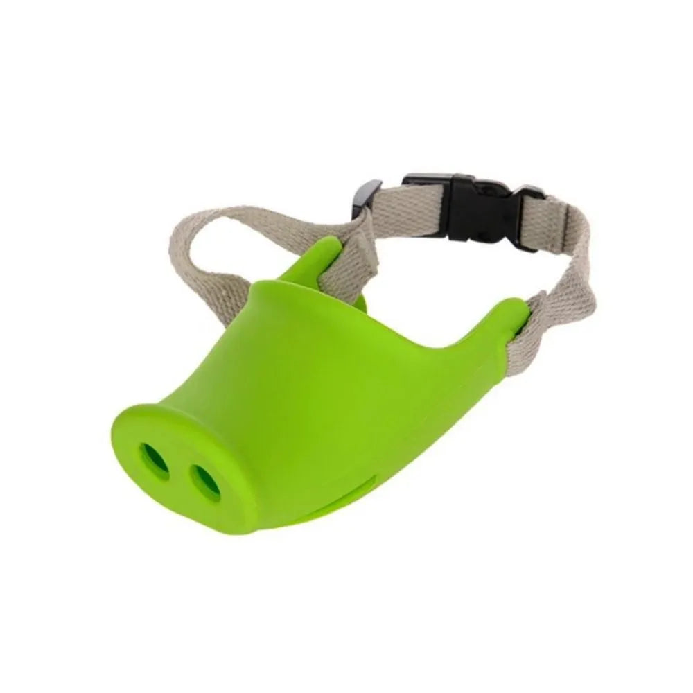 Green silicone anti-bite mouth cover muzzle for a long-mouthed dog on a white background.