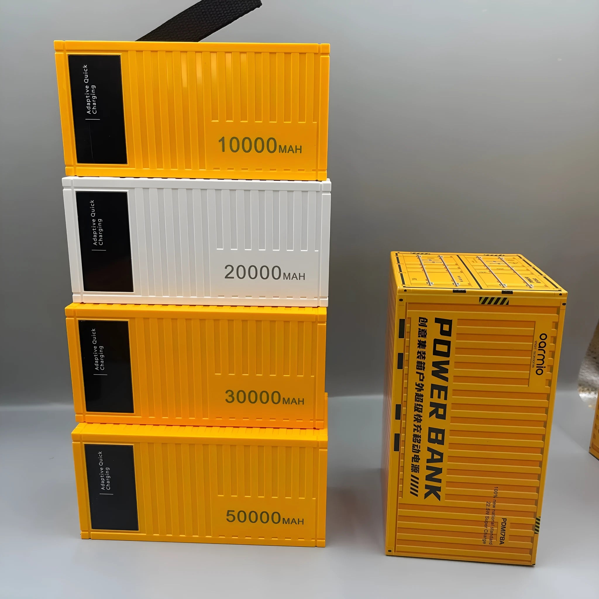 50000mAh black power bank with digital display, PVC shell, compact 145x70x65mm size