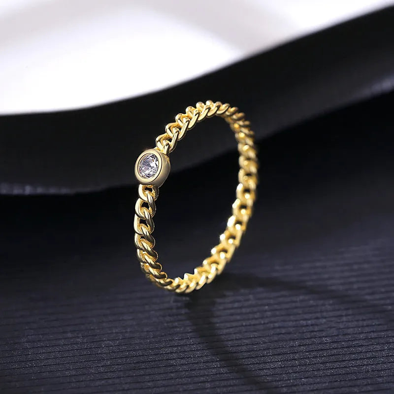 Twist gold ring in 925 sterling silver with geometric chain design, women's style, sizes 6 to 9.