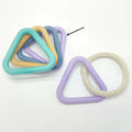 Triangular TPR foam dog tug toy with cotton rope centre, 13.5cm side length, violet colour