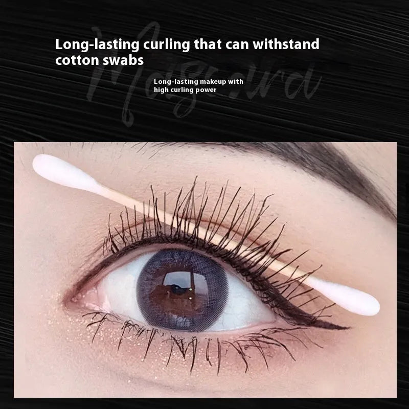 Black women's curly long mascara tube with brush, 14cm height, for lash volumising and definition