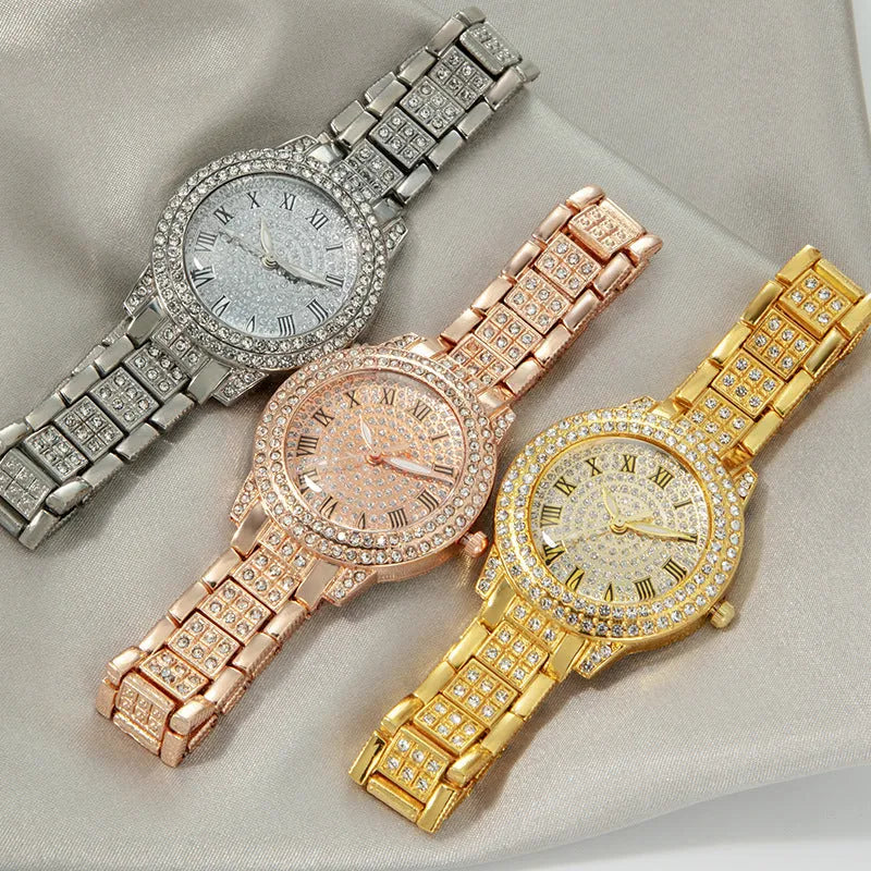 Women's starry rhinestone quartz analogue watch with gold Roman numeral dial and alloy bracelet