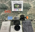 64 million HD mirrorless CCD camera with ABS body, black, front view showing lens and full HD screen