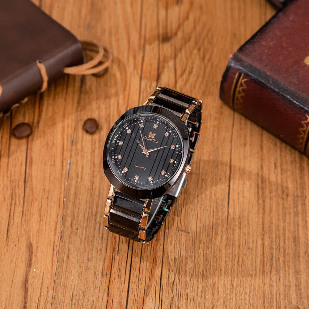 Men's black quartz watch with steel band, pointer display, and chronograph detail
