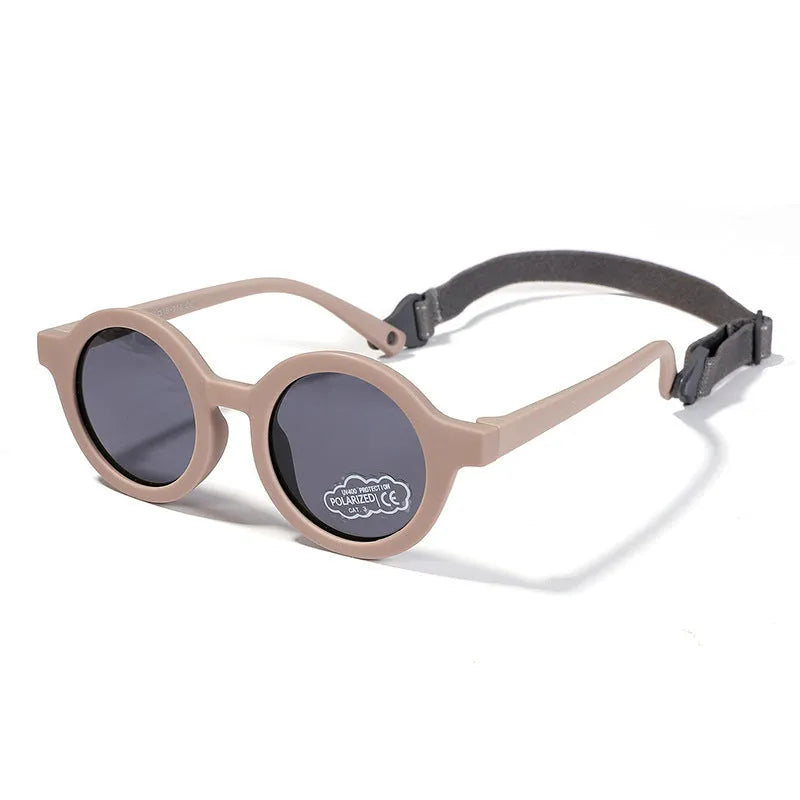 Children's silicone sunglasses for 0-3 year olds with round frame and polarized lenses in multiple colour options