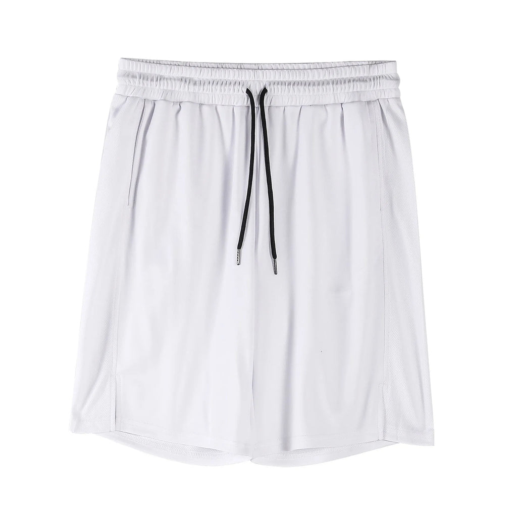Man wearing loose-fit black quick-dry mesh shorts for casual summer sportswear.